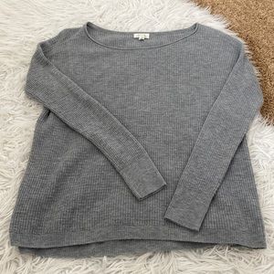 Grey sweater.